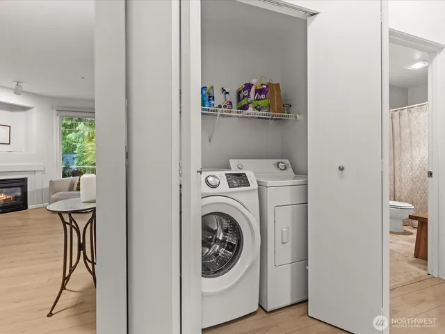 a work room with furniture and a window