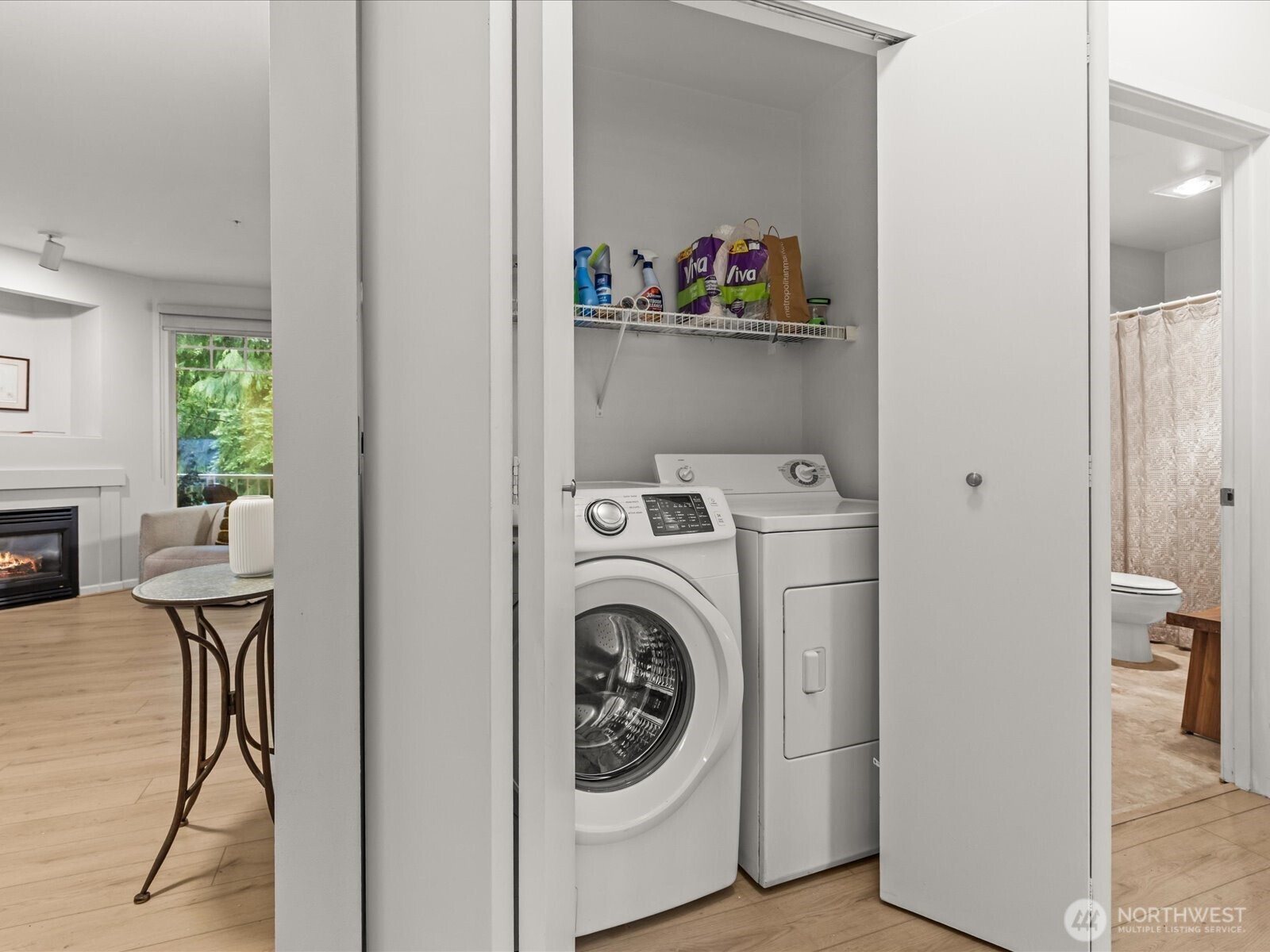 15150 140th Way Southeast, Unit P204 Renton, WA 98058 - Photo 19 of 28 a storage room with washer and dryer