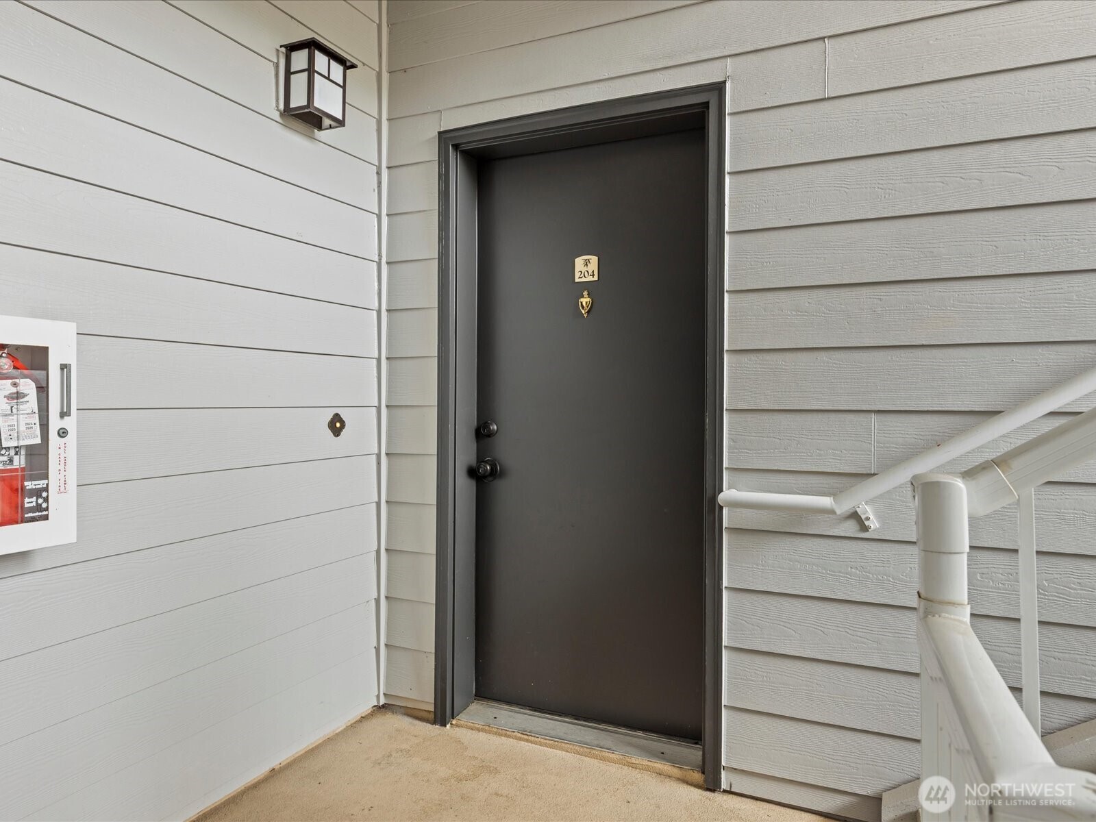 15150 140th Way Southeast, Unit P204 Renton, WA 98058 - Photo 28 of 28 a view of front door
