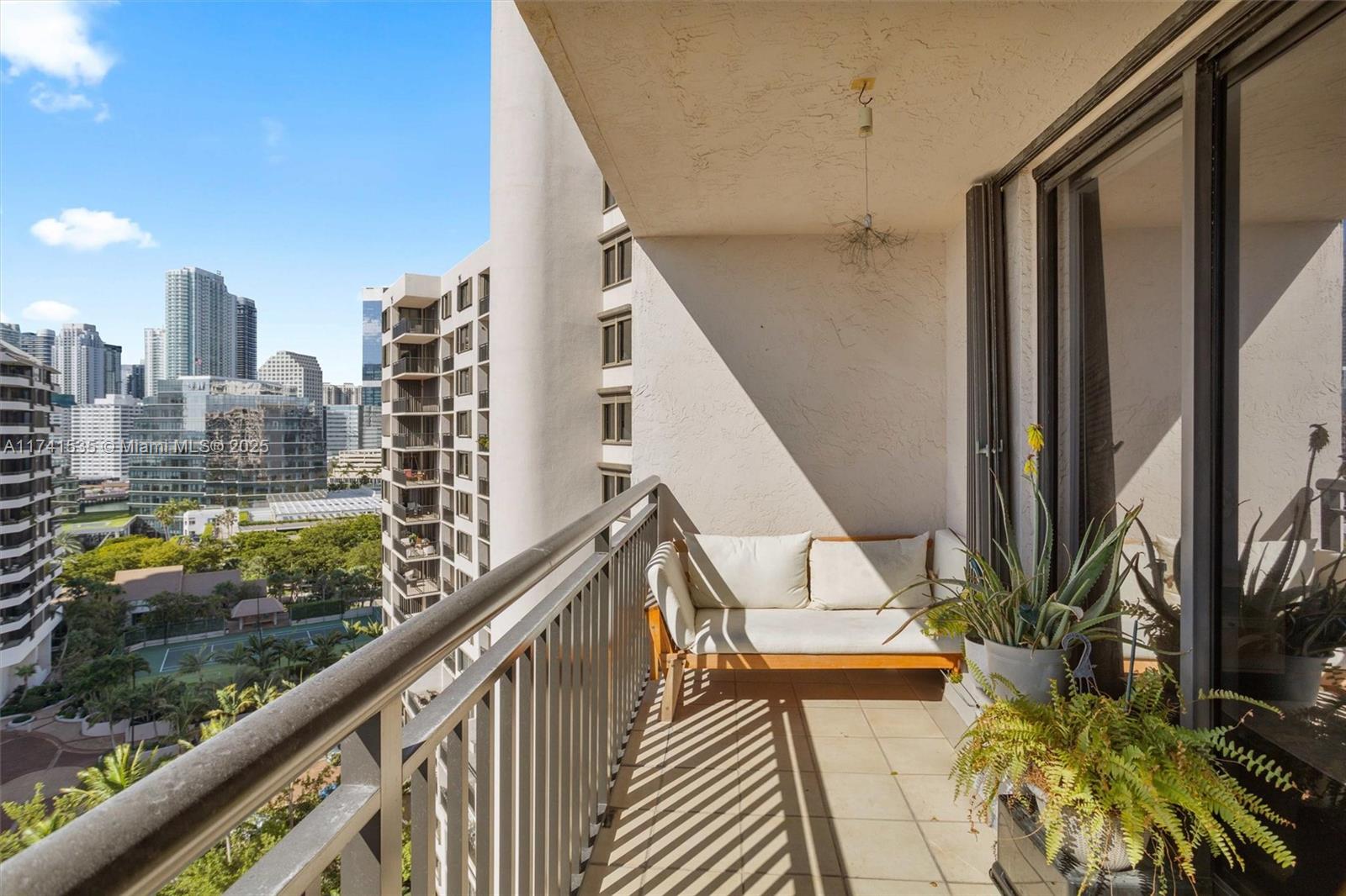 540 Brickell Key Drive, Unit 1519 Miami, FL 33131 - Photo 15 of 48 a view of balcony with furniture