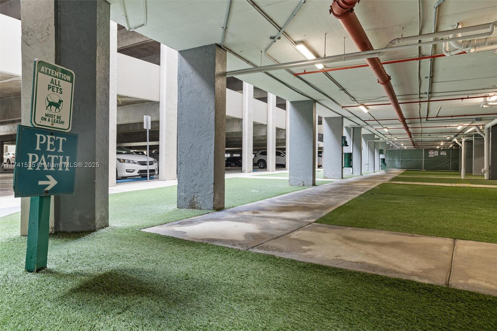 540 Brickell Key Drive, Unit 1519 Miami, FL 33131 - Photo 34 of 48 a view of a building with a yard