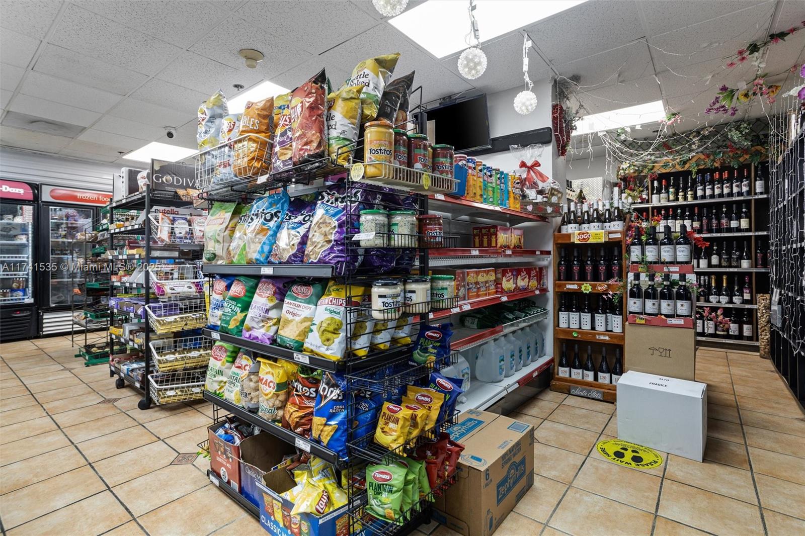 540 Brickell Key Drive, Unit 1519 Miami, FL 33131 - Photo 43 of 48 a store filled with lots of fruit and vegetables