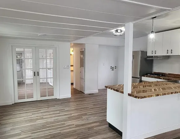 a view of kitchen island with wooden floor