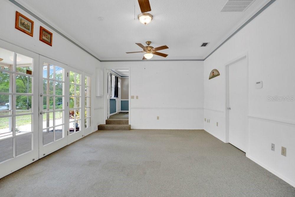 5137 Mt Plymouth Road Apopka, FL 32712 - Photo 35 of 58 an empty room with windows