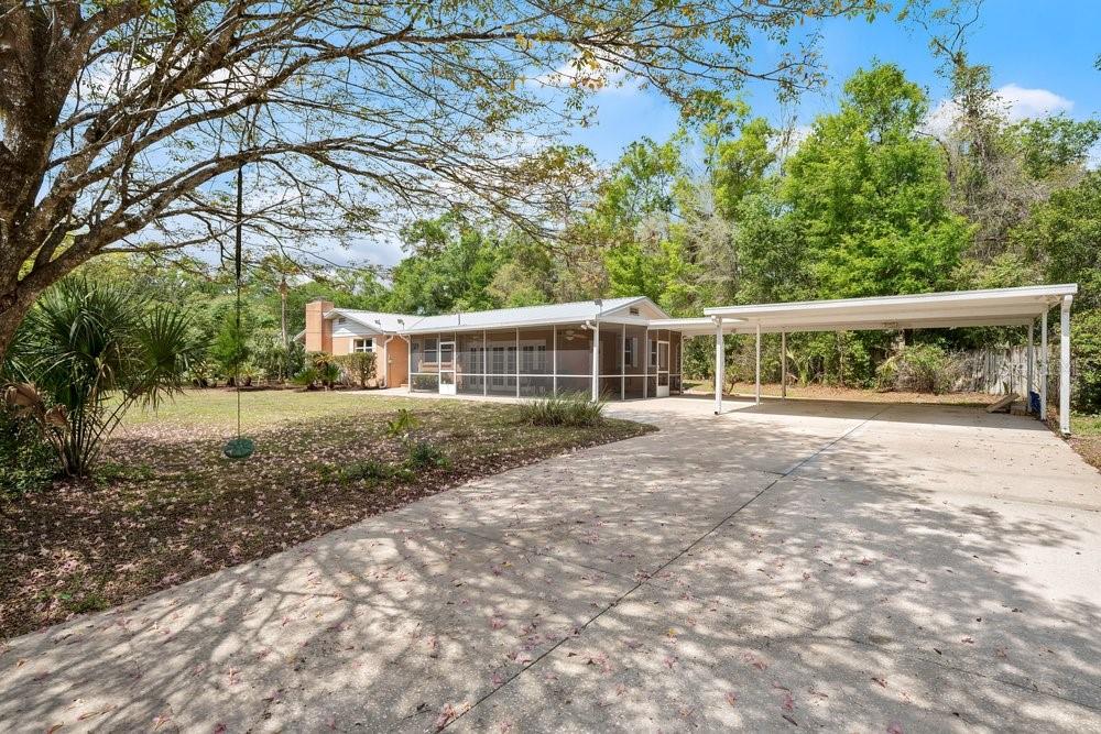 5137 Mt Plymouth Road Apopka, FL 32712 - Photo 4 of 58 front view of house with a yard