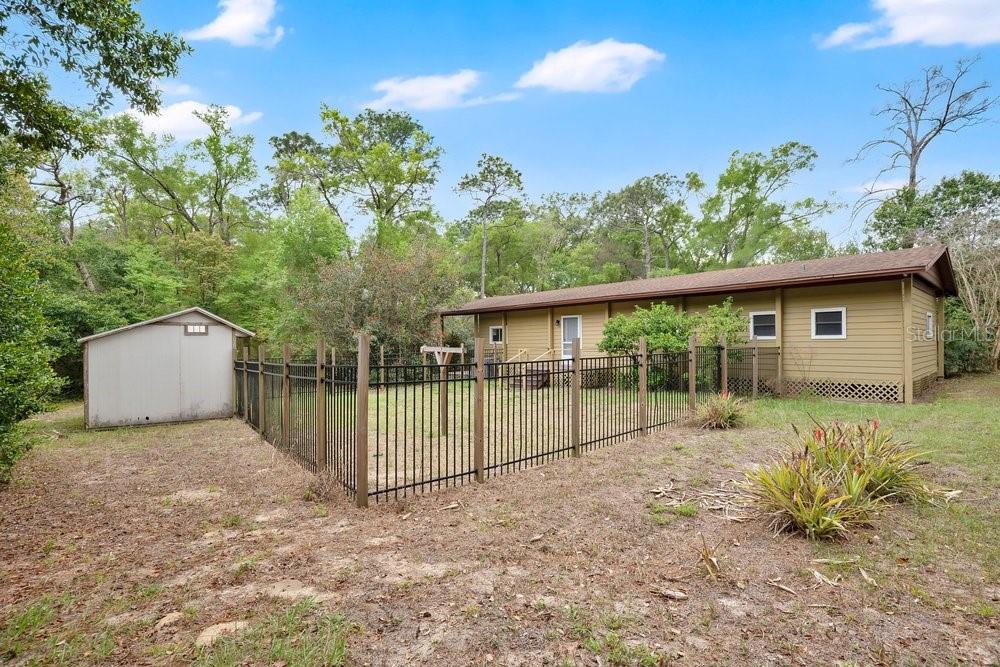 5137 Mt Plymouth Road Apopka, FL 32712 - Photo 52 of 58 a view of a backyard with a garden