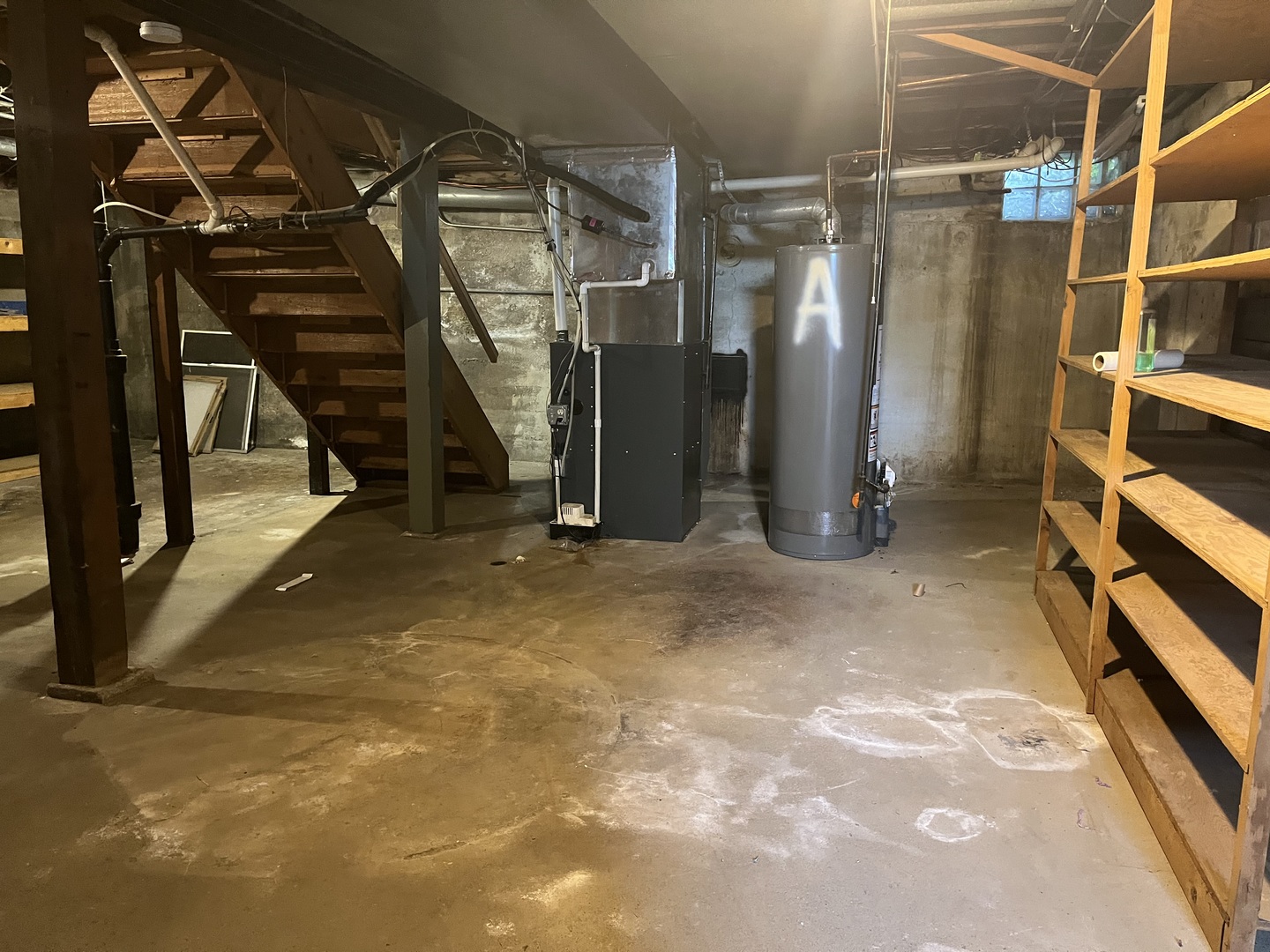 112 Chicago Road, Unit 1 Oswego, IL 60543 - Photo 22 of 29 a view of walk in closet with clothes and shoes