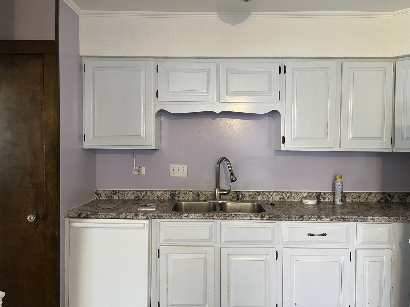 112 Chicago Road, Unit 1 Oswego, IL 60543 - Photo 6 of 29 a kitchen with white cabinets