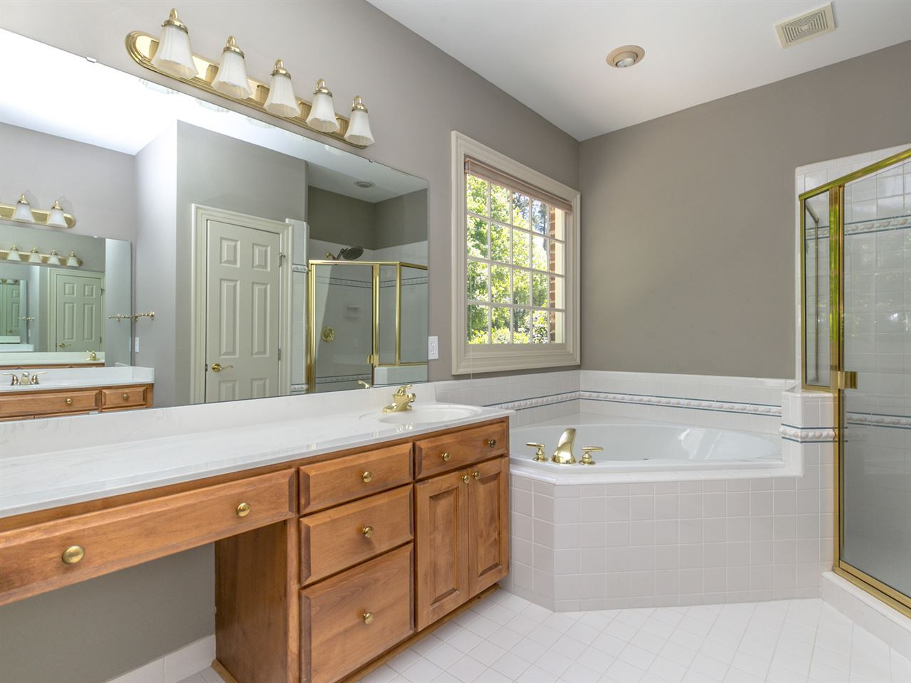 1609 Adams Mountain Road Raleigh, NC 27614 - Photo 12 of 29 The master bath has a water closet and separate his and hers walk-in closets with built in shelves. Master Bath/Spa
