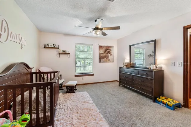 a view of a deck with a big yard