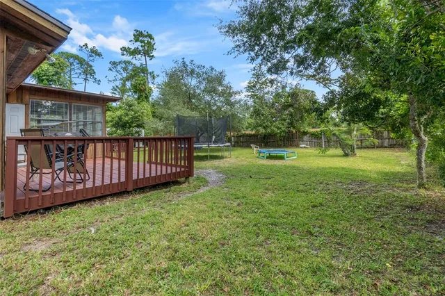 front view of a house with a garden