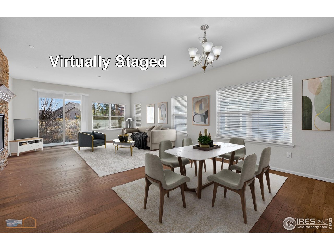 1435 Rustic Drive Longmont, CO 80504 - Photo 11 of 45 a view of a dining room with furniture window and wooden floor