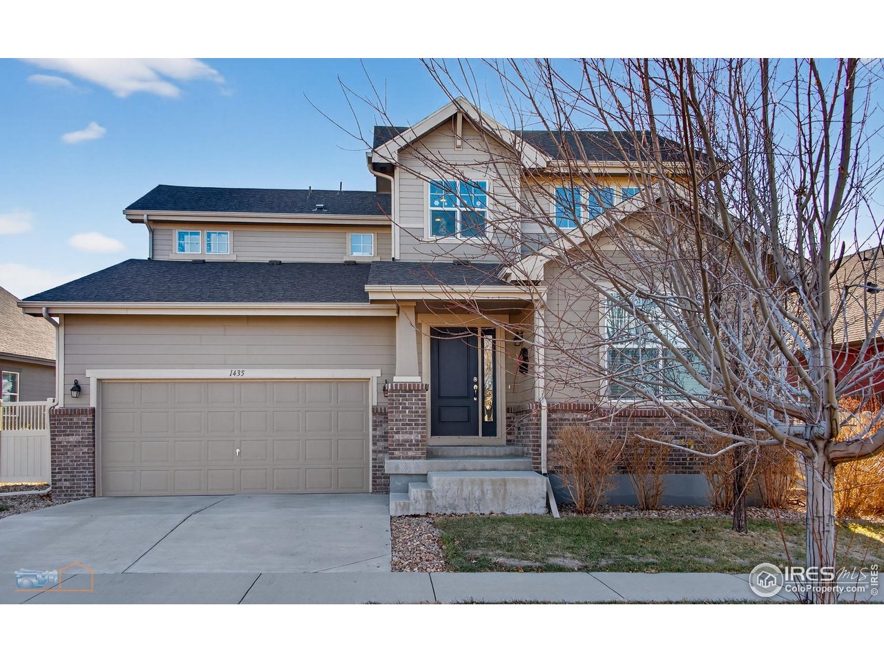1435 Rustic Drive Longmont, CO 80504 - Photo 2 of 45 a house view with a outdoor space