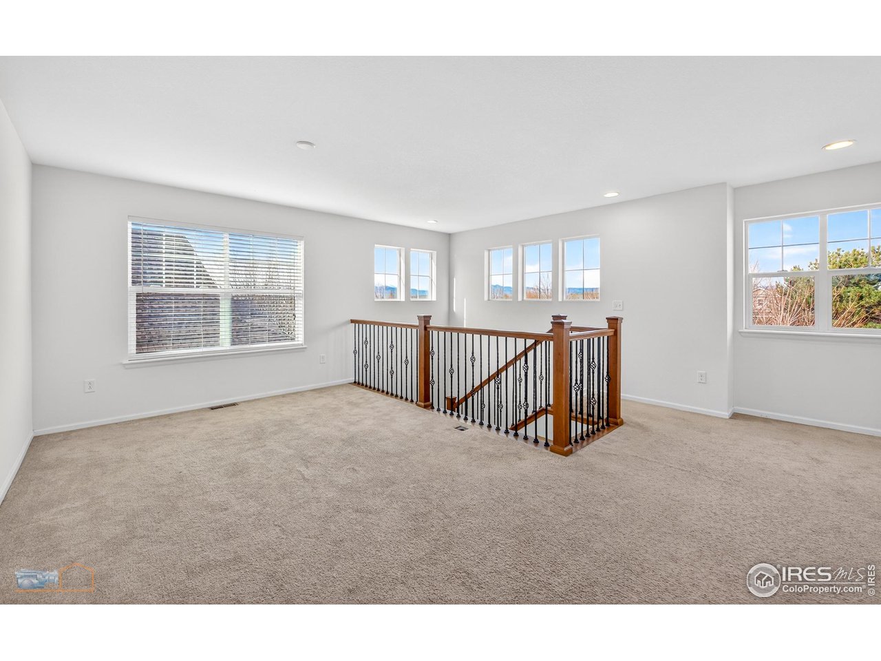 1435 Rustic Drive Longmont, CO 80504 - Photo 26 of 45 a view of a kitchen with furniture and windows