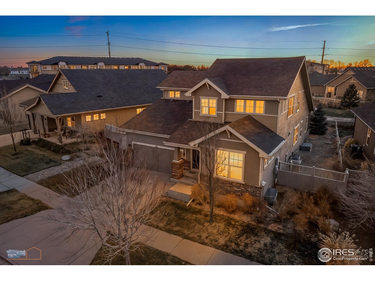 1435 Rustic Drive Longmont, CO 80504 - Photo 3 of 45 a view of a big house with a big yard