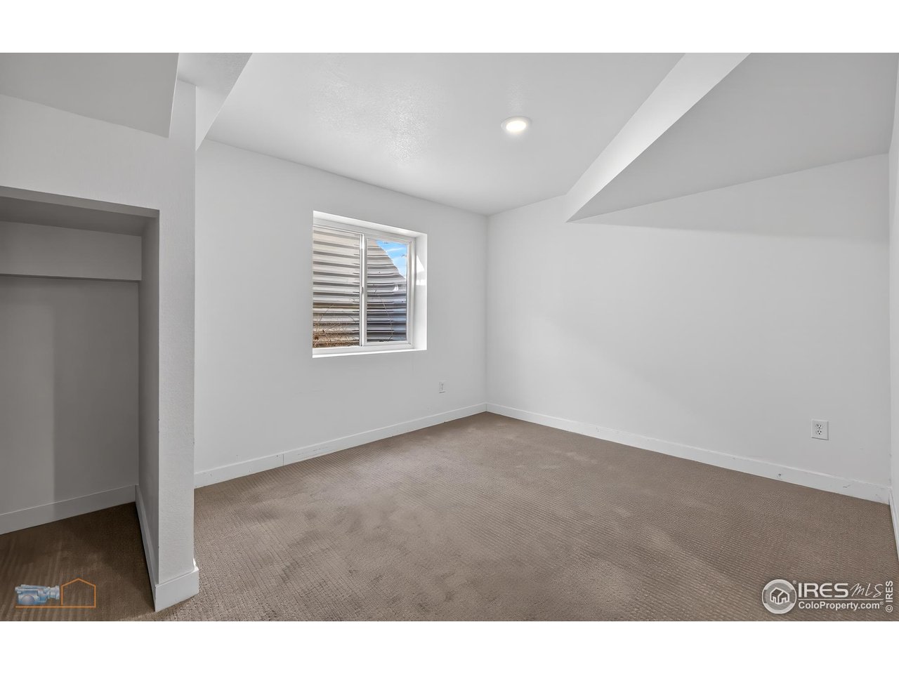 1435 Rustic Drive Longmont, CO 80504 - Photo 33 of 45 a view of an empty room with a window