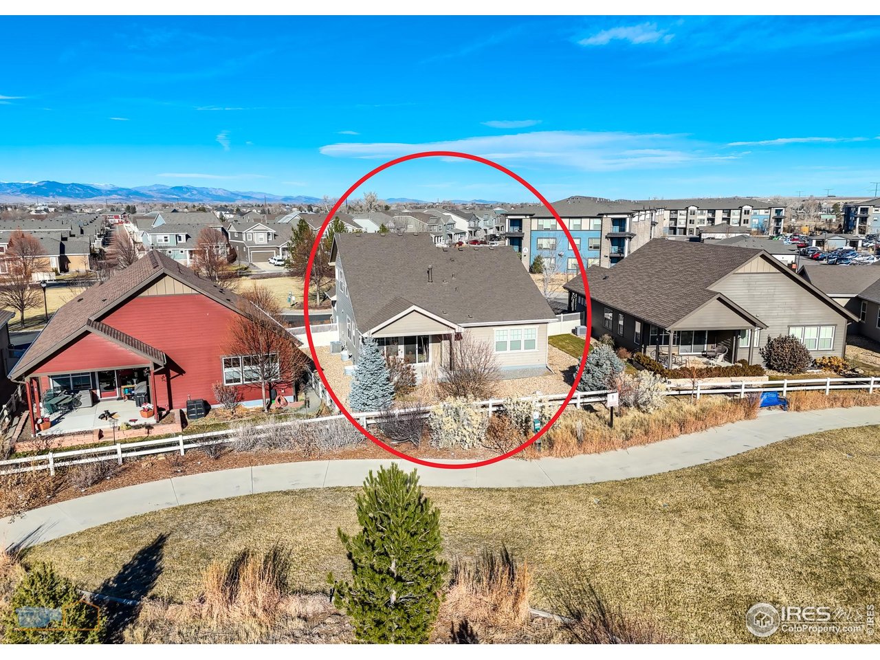 1435 Rustic Drive Longmont, CO 80504 - Photo 42 of 45 an aerial view of a house with swimming pool