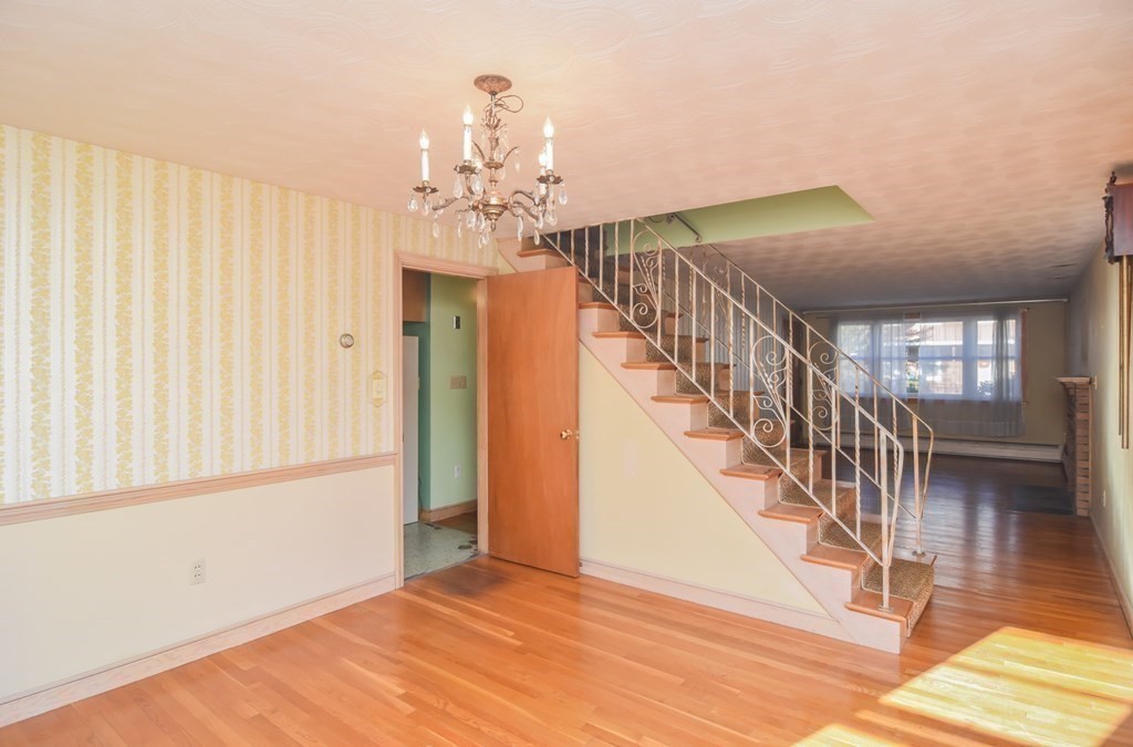 86 Clark Street Dedham, MA 02026 - Photo 14 of 28 a view of an entryway with wooden floor