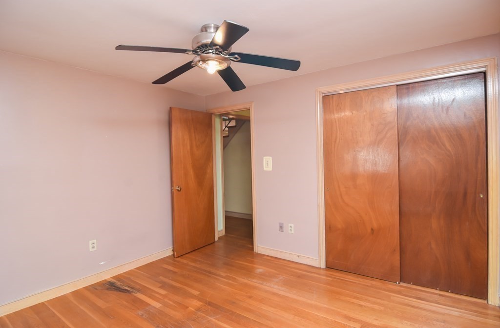 86 Clark Street Dedham, MA 02026 - Photo 24 of 28 a view of an empty room and wooden floor