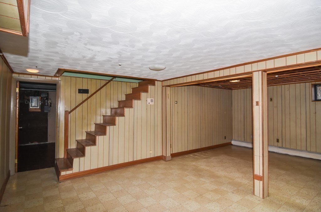 86 Clark Street Dedham, MA 02026 - Photo 26 of 28 a view of hallway with stairs