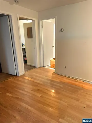 a kitchen with a sink a counter top space cabinets and stainless steel appliances