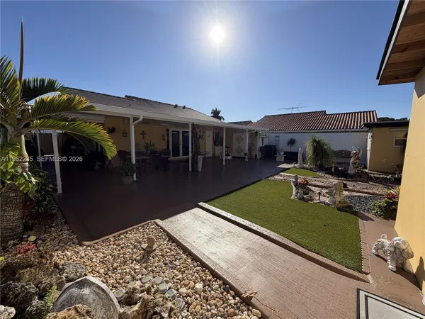 an outdoor space with furniture