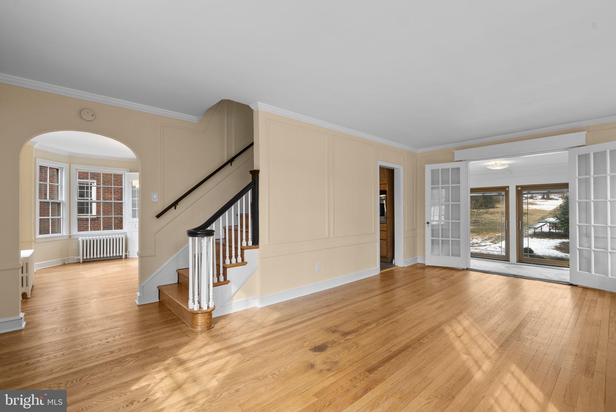 6413 Adelphi Road Hyattsville, MD 20782 - Photo 12 of 31 View from Living Room to Dining Room & Sun Room