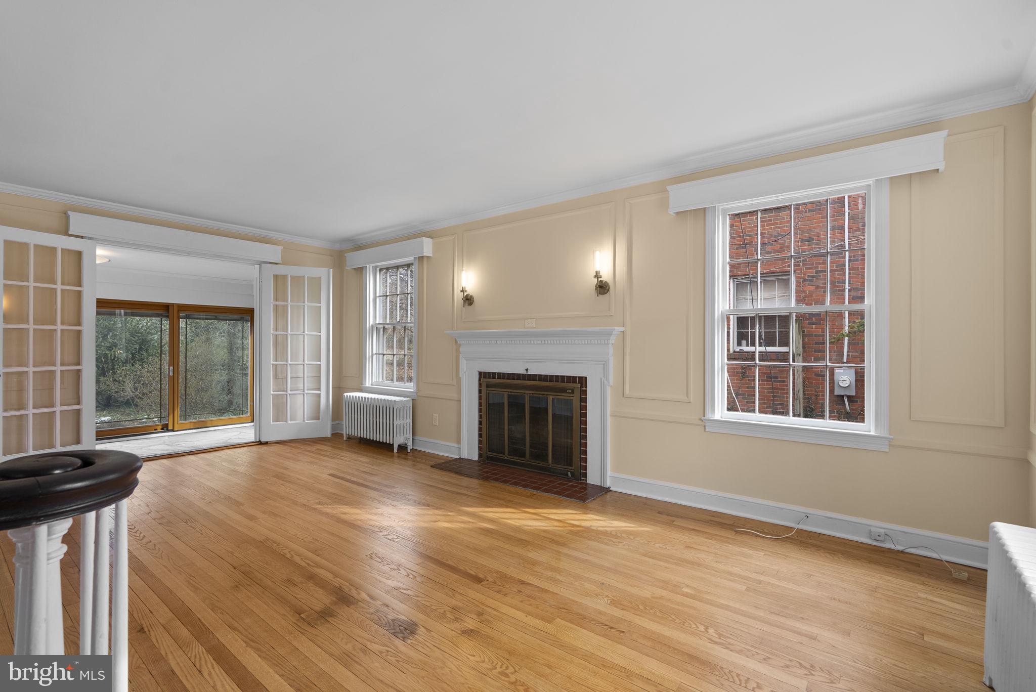 6413 Adelphi Road Hyattsville, MD 20782 - Photo 4 of 31 Spacious Living Room w/Access to Sun Room