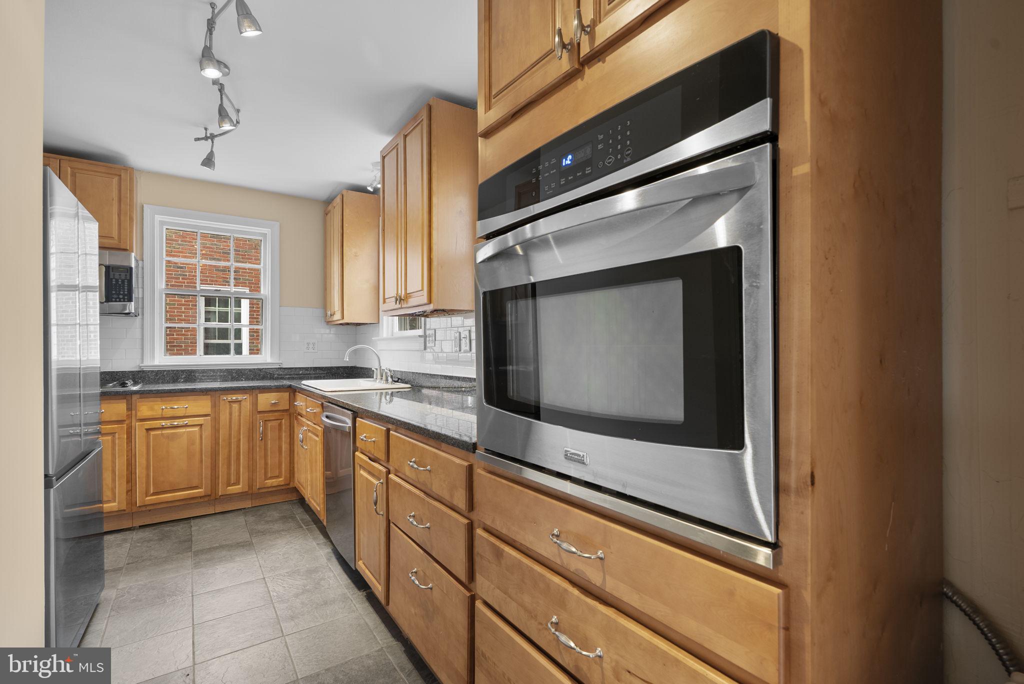 6413 Adelphi Road Hyattsville, MD 20782 - Photo 7 of 31 Kitchen Access from Living and Dining Room