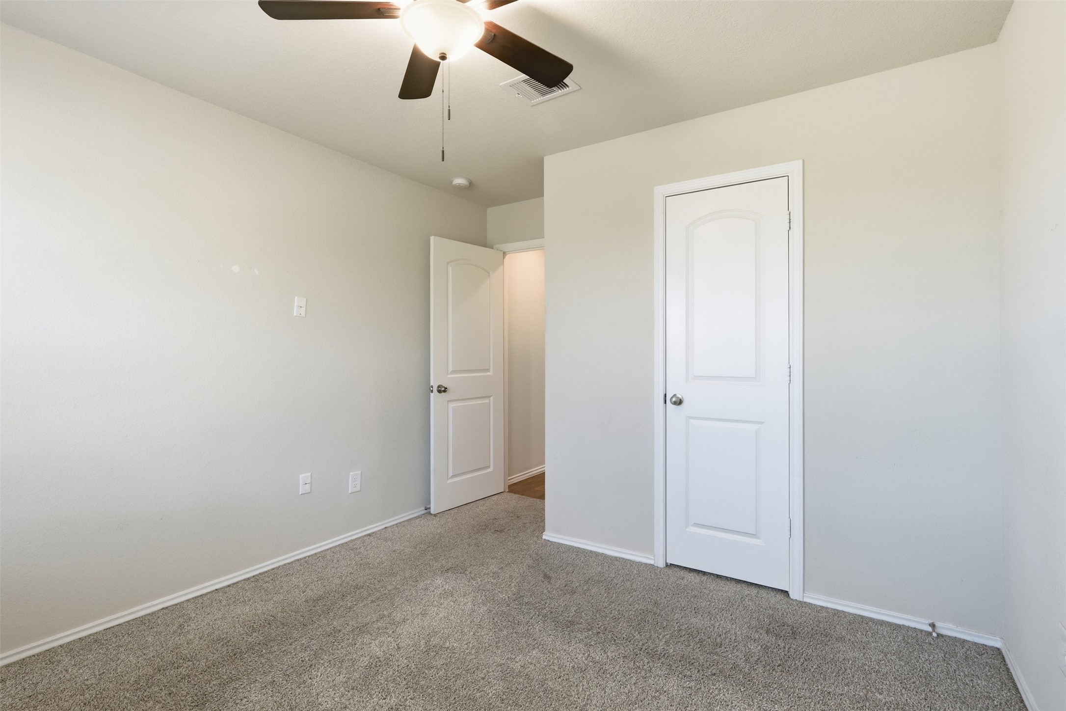2346 Gold Forsythia Ln Spring Spring, TX 77373 - Photo 27 of 39 Cozy and versatile secondary bedroom with soft carpeting and ample natural light, perfect for a guest room or home office.