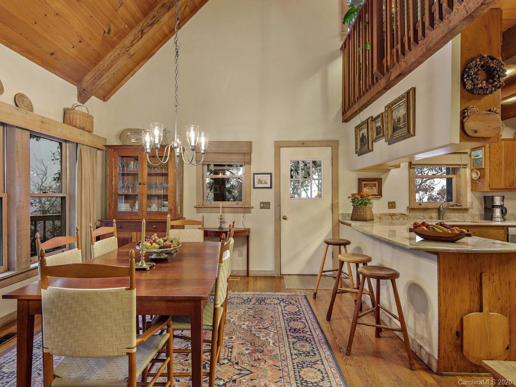 1703 Kims Cove Road Canton, NC 28716 - Photo 8 of 36 a view of a dining room with furniture