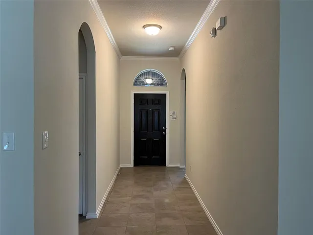 a view of a hallway with a entryway