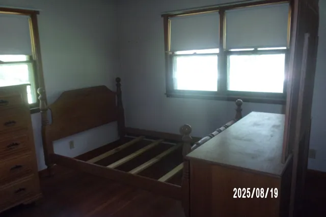 an empty room with a wooden door