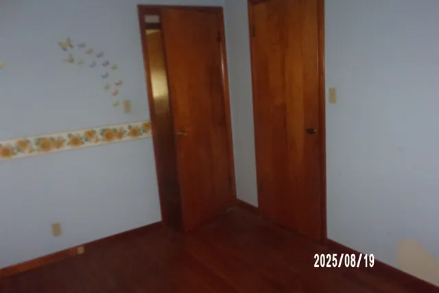 a view of a kitchen counter space and windows