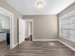 408 West 15th Street Houston, TX 77008 - Photo 3 of 10 Just beyond the living room is a flex space which can be used as a home office, dining room or a myriad of other things.