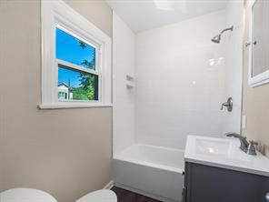 408 West 15th Street Houston, TX 77008 - Photo 6 of 10 The bathroom is accessed through the kitchen.