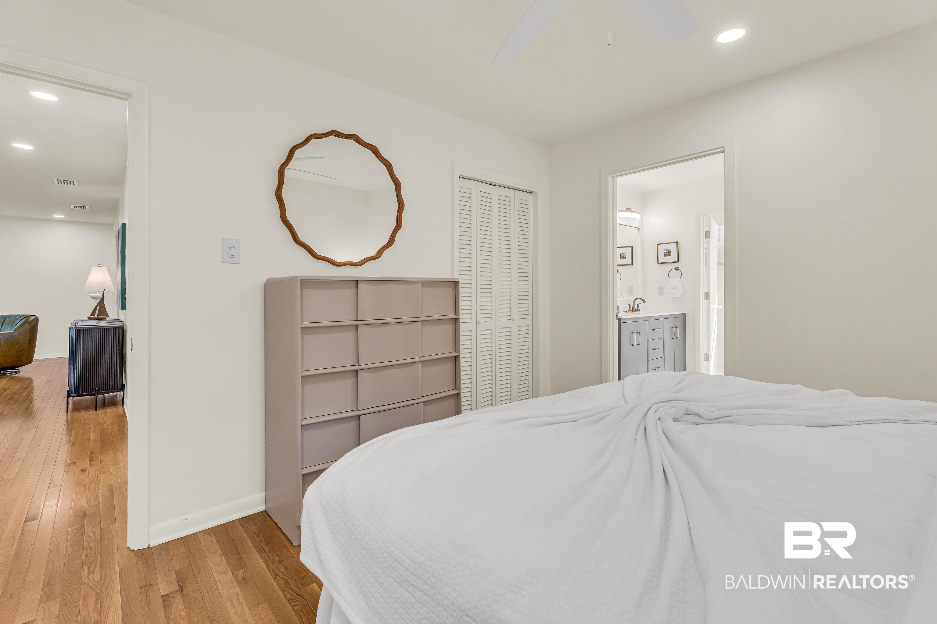 357 Azalea Street Fairhope, AL 36532 - Photo 9 of 22 Bedroom featuring recessed lighting, light wood finished floors, ceiling fan, a closet, and ensuite bathroom