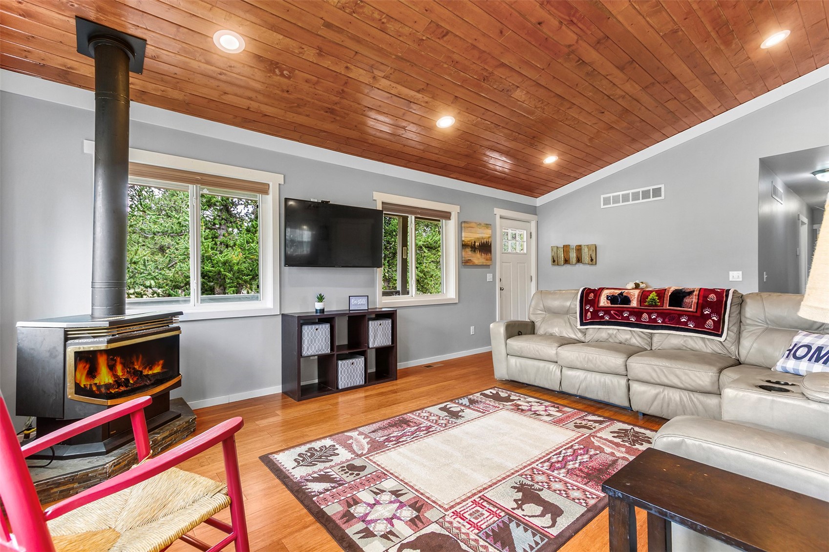 485 High Creek Road Fairplay, CO 80440 - Photo 7 of 32 Living room with a wood stove, recessed lighting, wood finished floors, wooden ceiling, and lofted ceiling