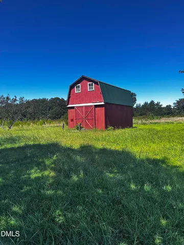 a view of a outdoor space with a swimming pool