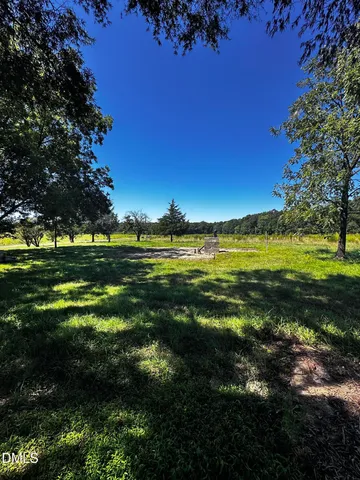 a view of a golf course with a lake