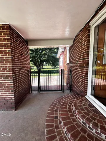 a view of a balcony with a porch