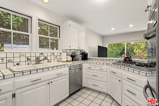 $2,895,000 | 172 South Woodburn Drive, Los Angeles, CA 90049