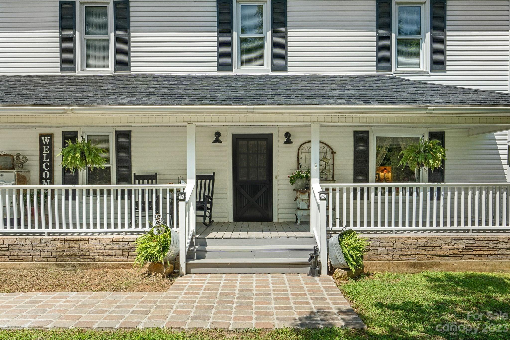 2080 Mountain Road Cleveland, NC 27013 - Photo 2 of 46 a view of a house with a small yard and wooden floor and fence