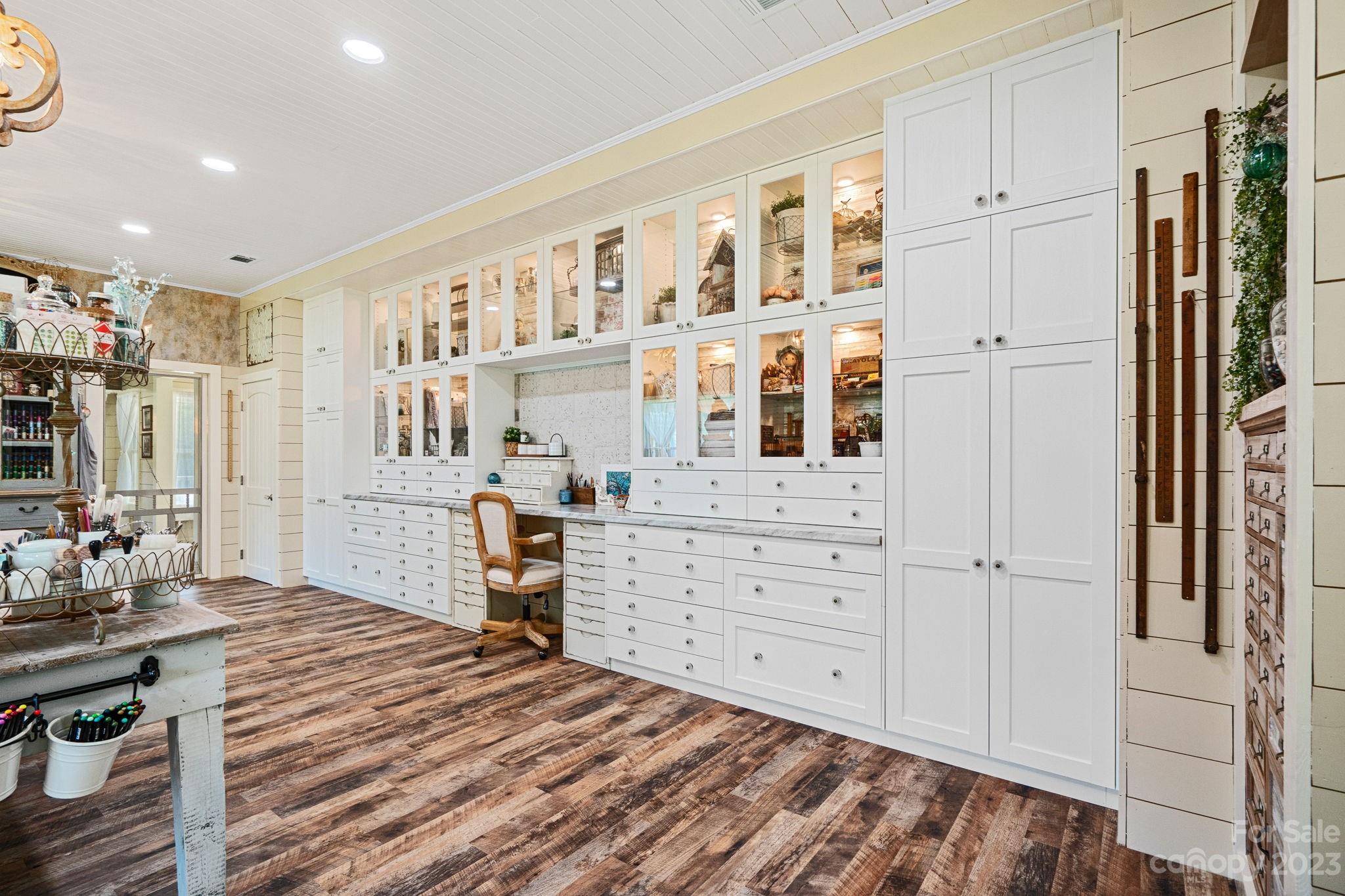 2080 Mountain Road Cleveland, NC 27013 - Photo 21 of 46 a room with a bed and a cabinets