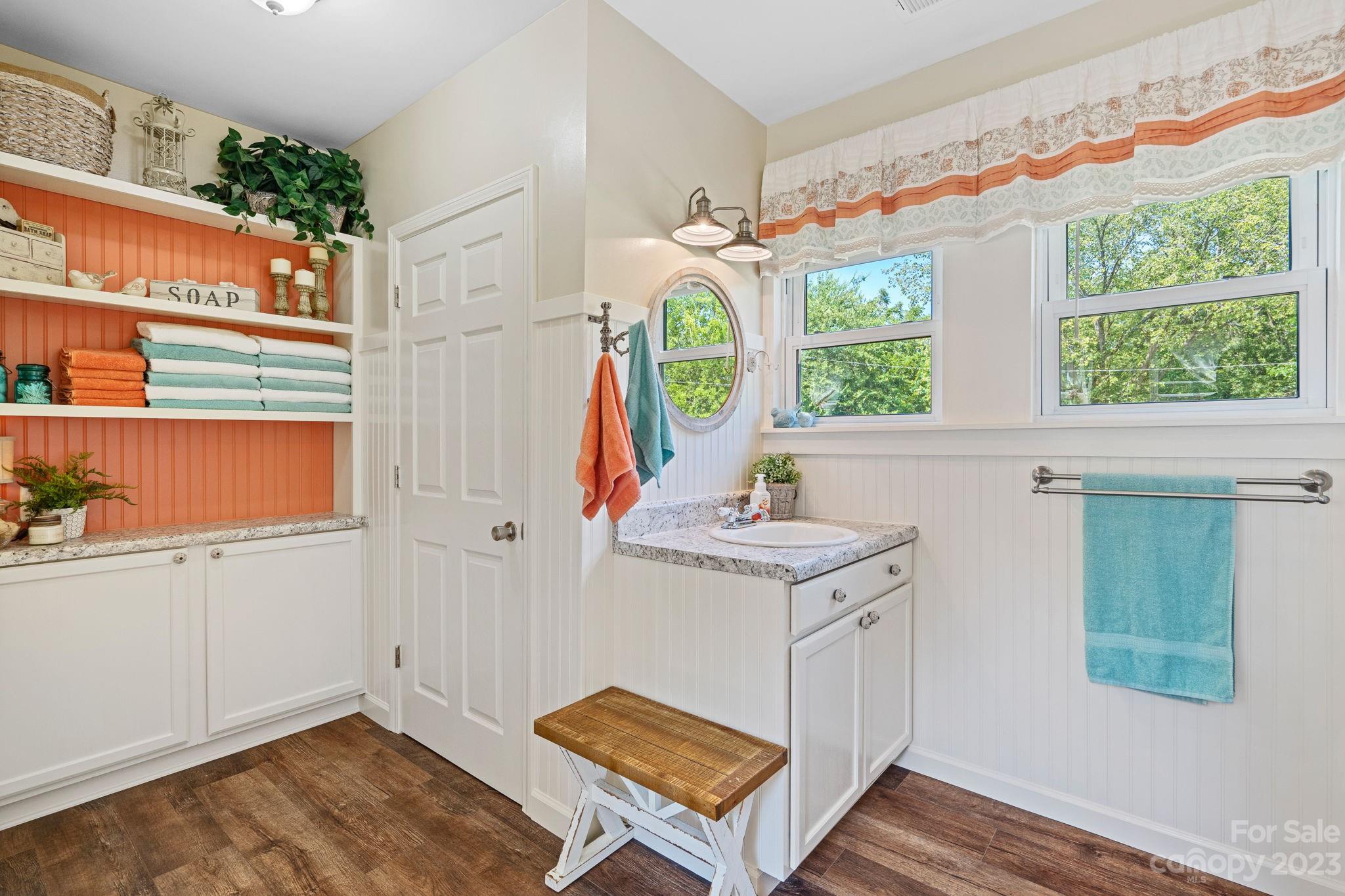 2080 Mountain Road Cleveland, NC 27013 - Photo 28 of 46 a view of a kitchen with wooden floor and window