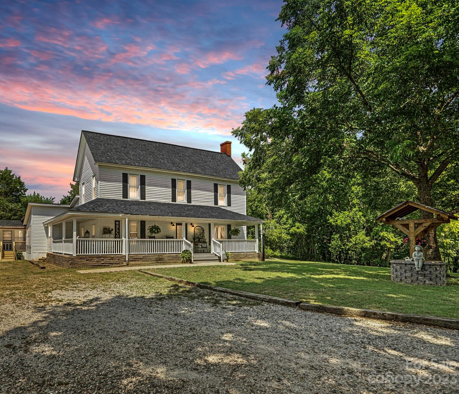 2080 Mountain Road Cleveland, NC 27013 - Photo 3 of 46 a front view of a house with a yard