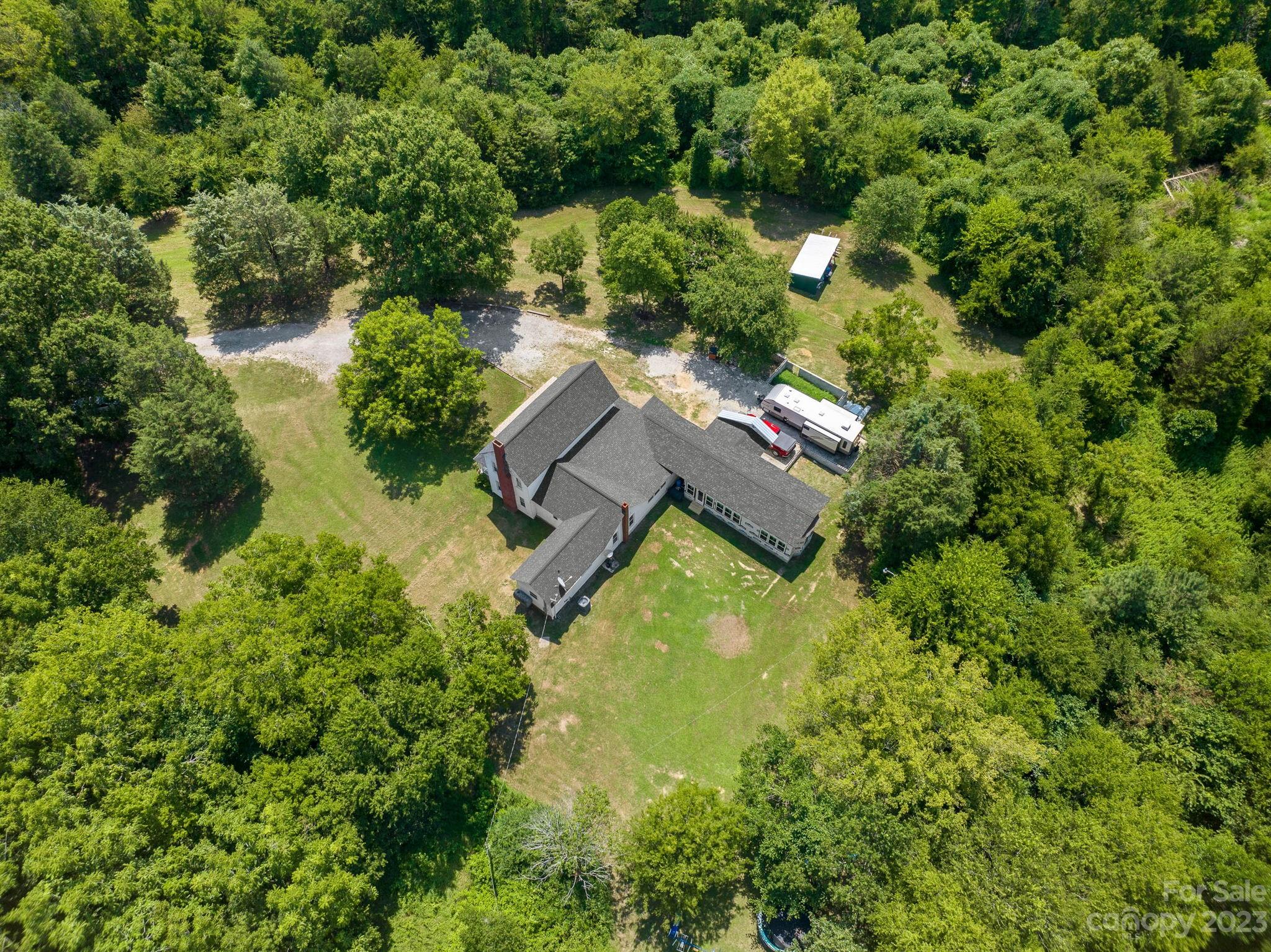 2080 Mountain Road Cleveland, NC 27013 - Photo 38 of 46 an aerial view of residential house with outdoor space and trees all around