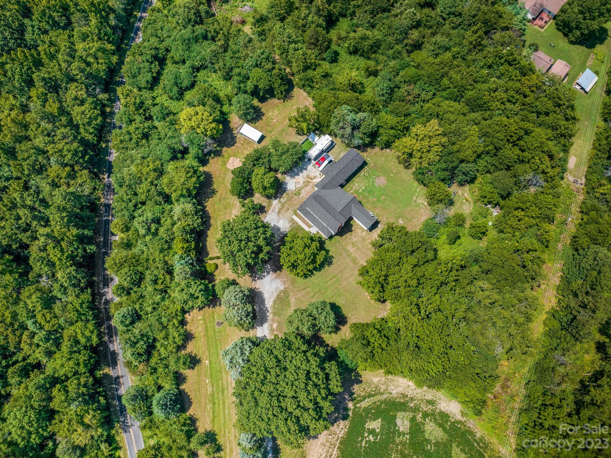 2080 Mountain Road Cleveland, NC 27013 - Photo 39 of 46 an aerial view of residential house with outdoor space and trees all around