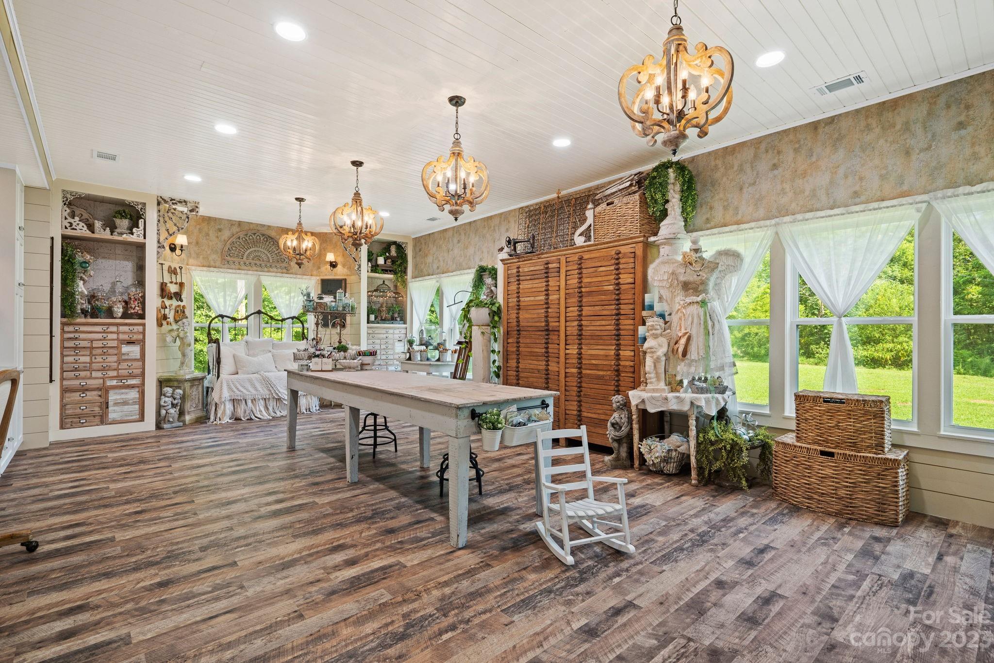 2080 Mountain Road Cleveland, NC 27013 - Photo 4 of 46 a view of a dining room with furniture window and wooden floor