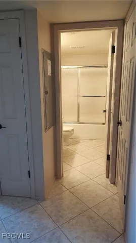 an empty room with a door